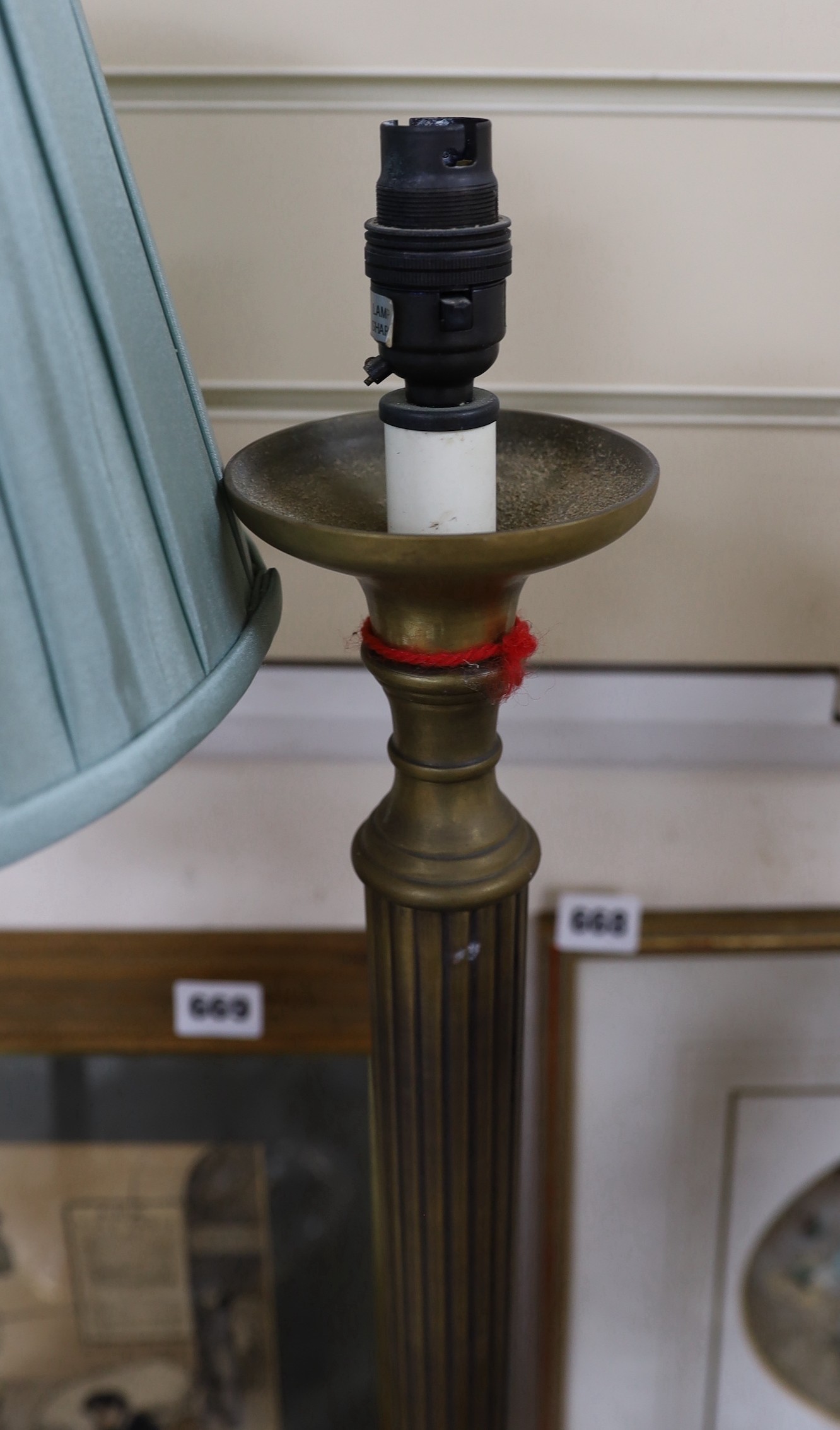 A pair of table lamps, a corinthian column table lamp and an anglepoise lamp